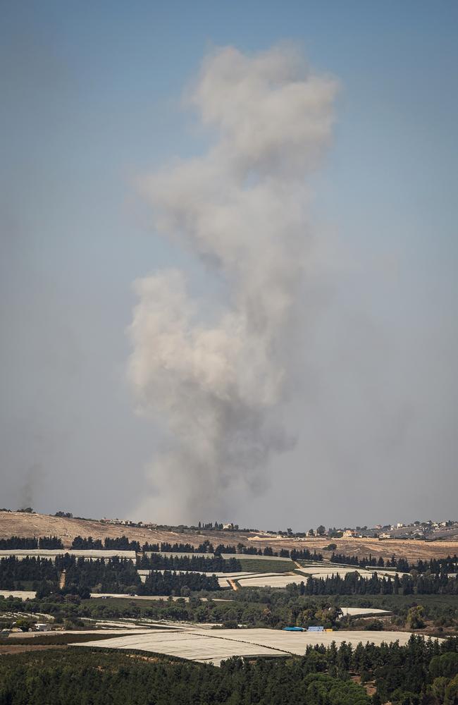 Smoke rises from a village across the border of Lebanon following a strike by the Israeli air force on October 4, in Rihaniya, Israel. The war between Israel and Hezbollah has entered a new phase as Israel has launched a ground offensive in southern Lebanon and escalated its aerial campaign there. Picture: AFP