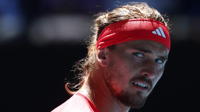 MELBOURNE, AUSTRALIA - JANUARY 24: Alexander Zverev of Germany reacts in the Men's Singles Semifinal against Novak Djokovic of Serbia during day 13 of the 2025 Australian Open at Melbourne Park on January 24, 2025 in Melbourne, Australia. (Photo by Graham Denholm/Getty Images)