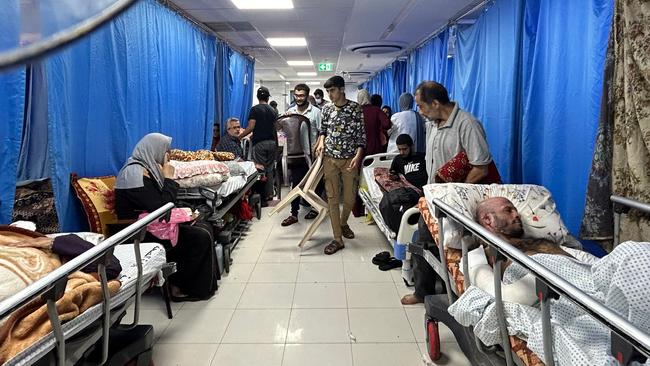 Patients and internally displaced people at al-Shifa hospital in Gaza City. Picture: AFP