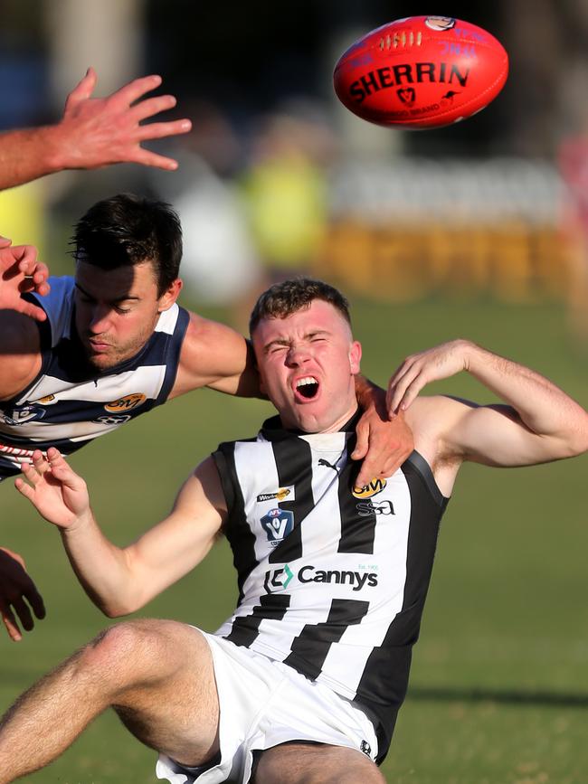 Wangaratta’s Darcy Melksham is taken high by Yarrawonga’s Harry Wheeler. Picture: Yuri Kouzmin