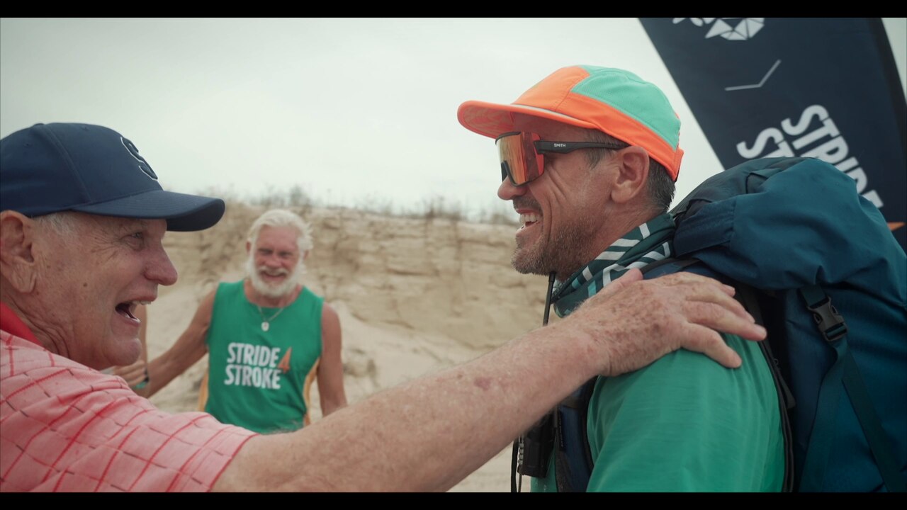 Lee Carseldine with his father Stuart after completing a Stride4Stroke challenge on Fraser Island