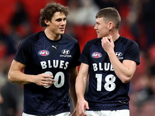 SYDNEY, AUSTRALIA - JULY 06: Charlie Curnow and Sam Walsh of the Blues warm up prior to the round 17 AFL match between Greater Western Sydney Giants and Carlton Blues at ENGIE Stadium, on July 06, 2024, in Sydney, Australia. (Photo by Brendon Thorne/AFL Photos/via Getty Images)