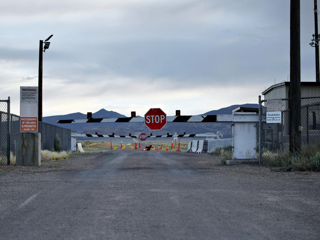 Signs warn about trespassing at an entrance to the Nevada Test and Training Range near Area 51 outside of Rachel, Nevada. Picture: AP/John Locher