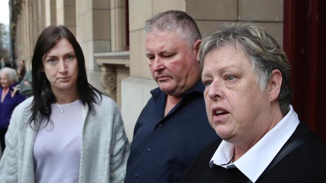 Emily Harris, Luke’s stepfather Kevin Harris and mother Michelle Harris. Picture: David Crosling