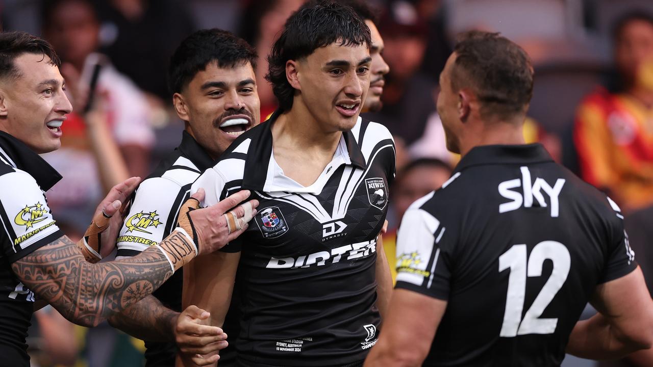 SYDNEY, AUSTRALIA - NOVEMBER 10: Casey McLean of New Zealand celebrates with team mates after scoring a try during the 2024 Pacific Championships Pacific Bowl Men's match between the New Zealand Kiwis and PNG Kumuls at CommBank Stadium on November 10, 2024 in Sydney, Australia. (Photo by Matt King/Getty Images)