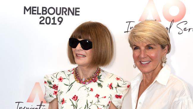 Fashion editor Anna Wintour (left) and Australian federal politician Julie Bishop (right) react at the 2019 Australian Open Inspirational Series Brunch in Melbourne, Australia, Thursday January 24, 2019. (AAP Image/Tennis Australia, Fiona Hamilton) NO ARCHIVING, EDITORIAL USE ONLY