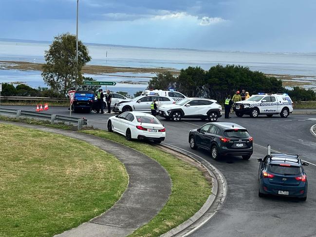 Motorists are facing major traffic delays after a crash on Phillip Island Rd, just before the San Remo Bridge, where a car rolled and landed upside down on Wednesday afternoon. Picture: Facebook/Ellen Jayne