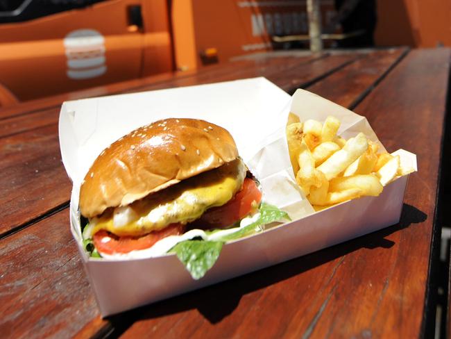 N31co560 The popularity of food vans is skyrocketing in Moreland. Mr Burger is one of the new kids on the block that regularly parks outside the bar Penny Black on Sydney Road, Brunswick.