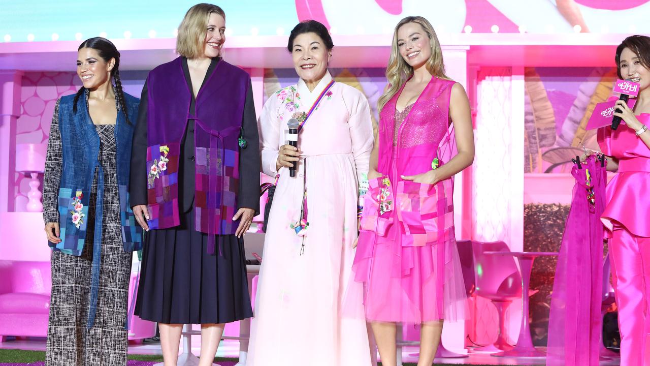 America Ferrera, Greta Gerwig and Margot Robbie were given hanboks during their visit. Picture: Chung Sung-Jun/Getty Images