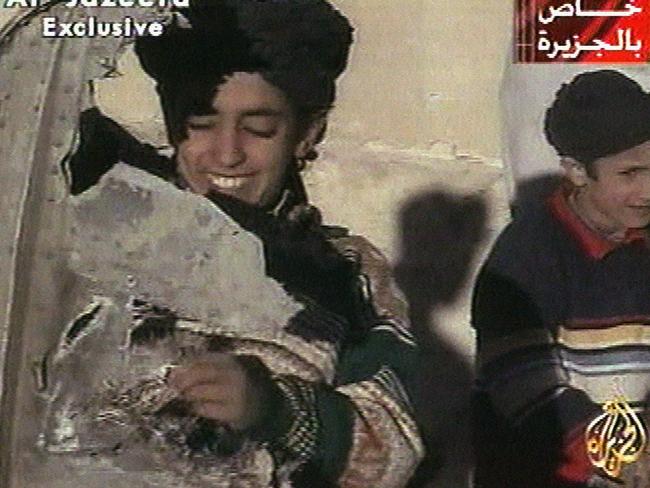 Video broadcast in 2001 with Hamza Bin Laden holding what the Taliban said was a piece of U.S. helicopter wreckage in Ghazni, Afghanistan Picture: Al-Jazeera.