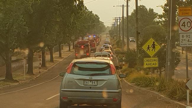 A convoy of vehicles exits Corryong. Picture: Twitter/@KiLeRaD