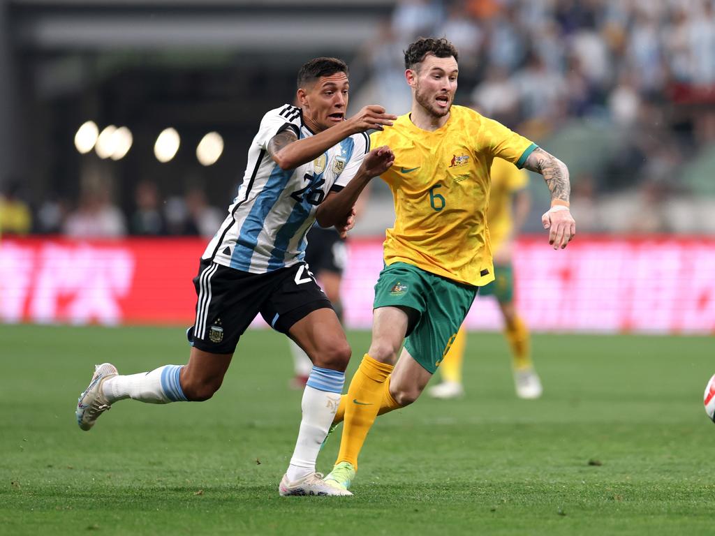 Socceroo Aiden O'Neill (right) battles with Argentina’s Nahuel Molina in China earlier this month. Picture: Lintao Zhang/Getty Images