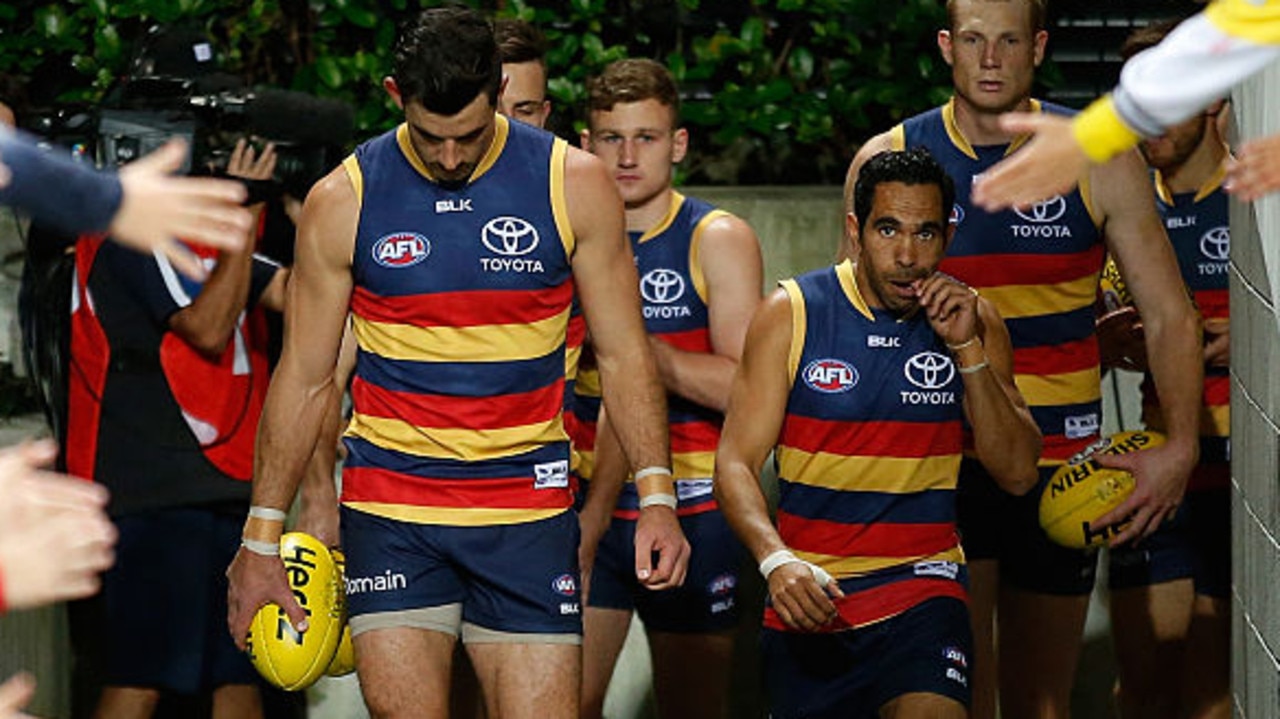 SYDNEY, AUSTRALIA - SEPTEMBER 17: Taylor Walker (left) and Eddie Betts of the Crows walk onto the field during the 2016 AFL First Semi Final match between the Sydney Swans and the Adelaide Crows at the Sydney Cricket Ground on September 17, 2016 in Sydney, Australia. (Photo by Michael Willson/AFL Media/Getty Images)