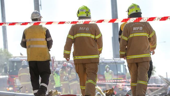 Firefighters on the scene. Picture: Ian Currie