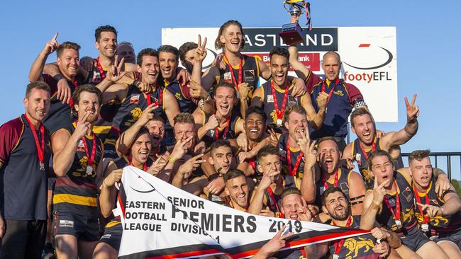 Doncaster East players celebrating last year’s grand final win. Picture: Valeriu Campan