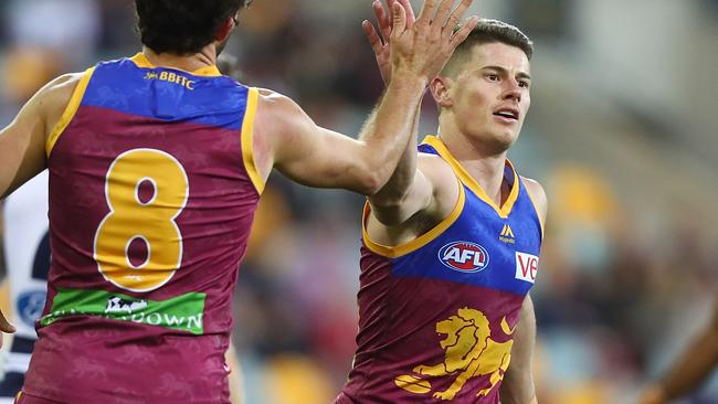 Dayne Zorko celebrates one of his four goals.