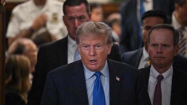 Donald Trump leaves for a lunch break during his civil fraud trial at the New York State Supreme Court in New York City. Picture: AFP.