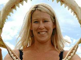 Warregah Island mother Annette Lenard with the jaws of the bull shark her husband caught last weekend. . Picture: Debrah Novak