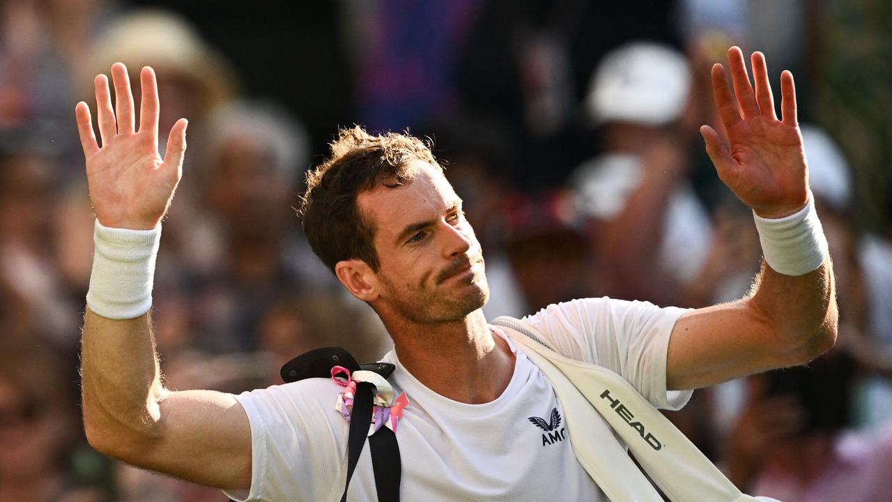 Murray waves to the public after his defeat at last year’s Wimbledon. (Photo by SEBASTIEN BOZON / AFP)