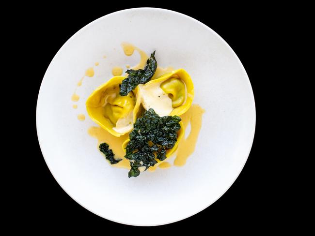 Entree — Chicken heart and mushroom tortellini with cavolo nero and egg sauce.