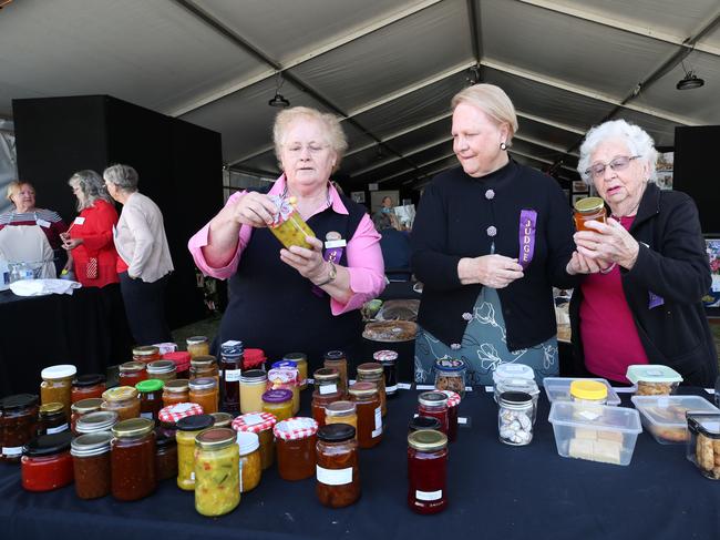 CWA judges Maree Harvey, Linda Ashton and Averial Mahony get down to business in the Arts and Crafts Pavilion. Picture Glenn Hampson