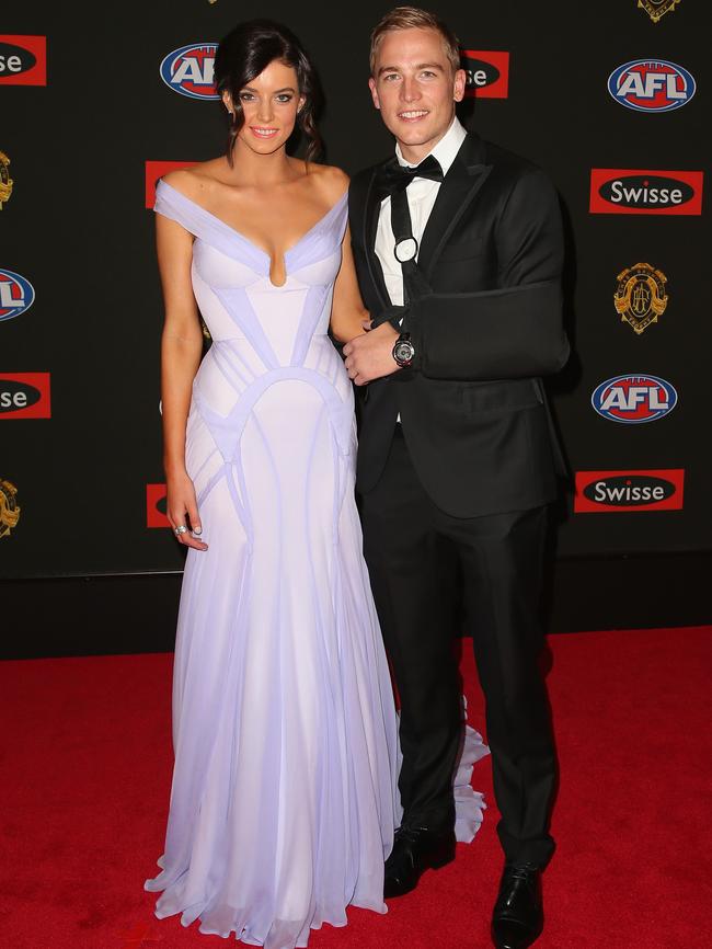 Bernie Vince of the Melbourne Demons and his partner Abbie Noonan.