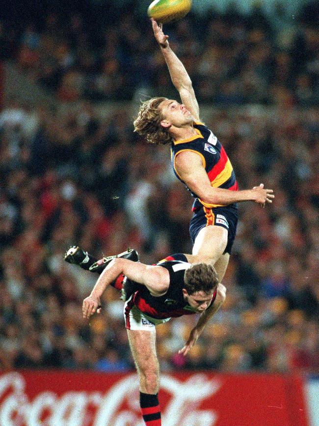 Crows full foward Tony Modra attempts a spectacular mark in 1994.