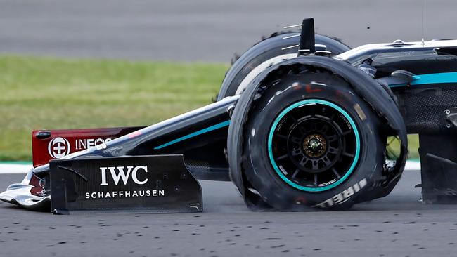 The punctured tyre of Mercedes' British driver Lewis Hamilton