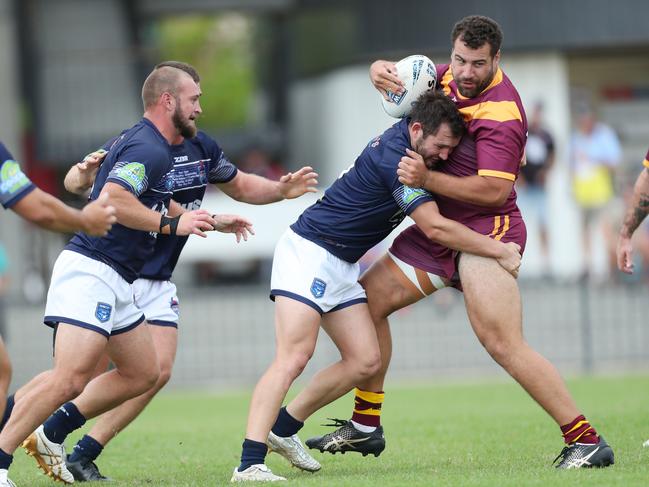 Riverina’s Jake Walker is tackled. Picture: Sue Graham