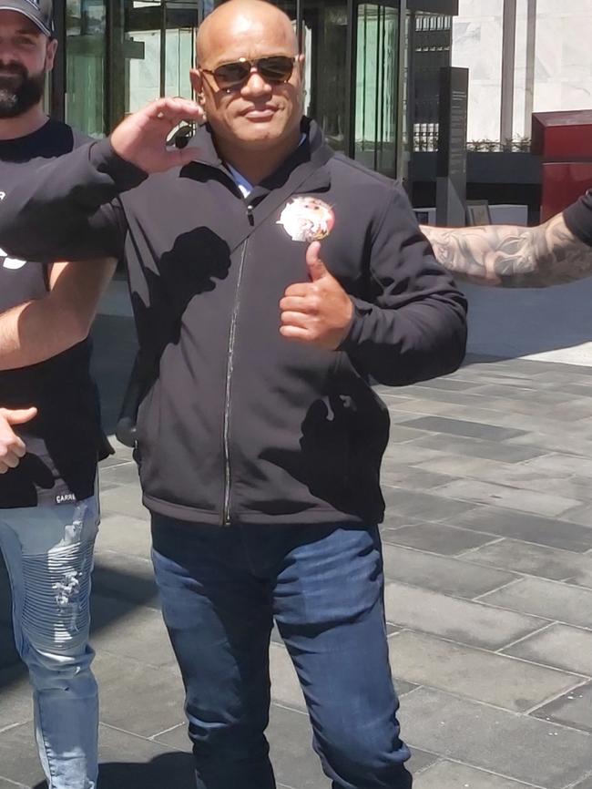 Pitasoni Ulavalu celebrates his acquittal on an affray charge outside the ACT Magistrates Court earlier this year. Picture: Craig Dunlop