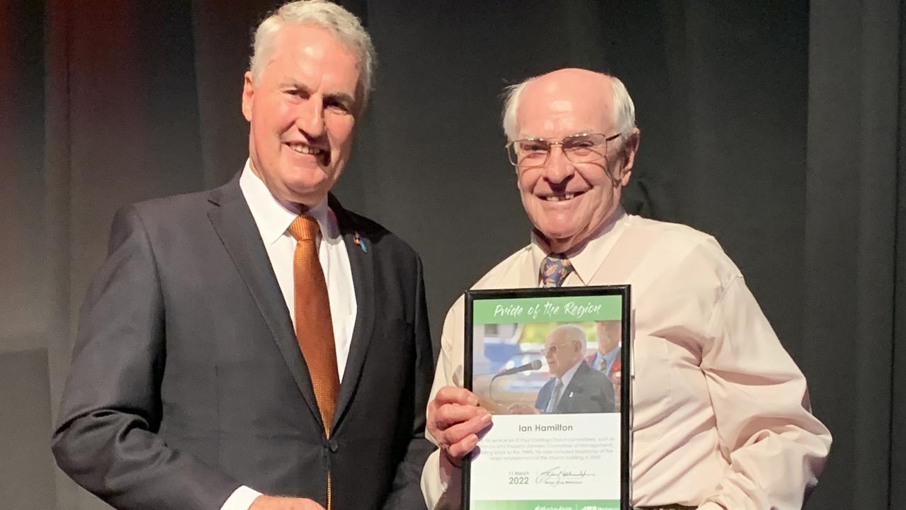 Lifelong St Paul's Uniting Church member Ian Hamilton receives the Pride of the Region award from Mackay Mayor Greg Williamson at the MECC on March 11. Picture: Duncan Evans