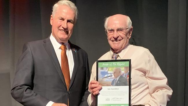 Lifelong St Paul's Uniting Church member Ian Hamilton receives the Pride of the Region award from Mackay Mayor Greg Williamson at the MECC on March 11. Picture: Duncan Evans