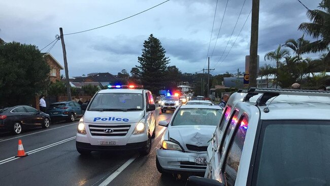 A woman was charged with assaulting police after crashing her car into a parked vehicle at Wamberal on Sunday, June 21. Picture: Facebook – Skaie Hull NBN News