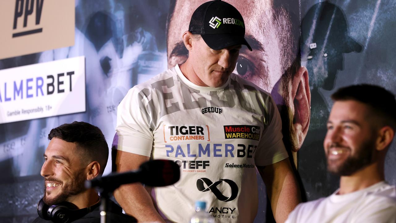 Kris Terzievski laughs as Paul Gallen walks out of a press conference. (Photo by Mark Kolbe/Getty Images)