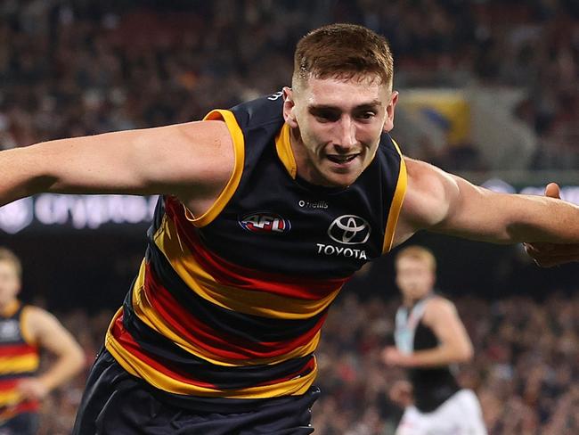 ADELAIDE, AUSTRALIA - JULY 29: Mark Keane of the crows and Charlie Dixon of the Power during the 2023 AFL Round 20 match between the Adelaide Crows and the Port Adelaide Power at Adelaide Oval on July 29, 2023 in Adelaide, Australia. (Photo by Sarah Reed/AFL Photos via Getty Images)