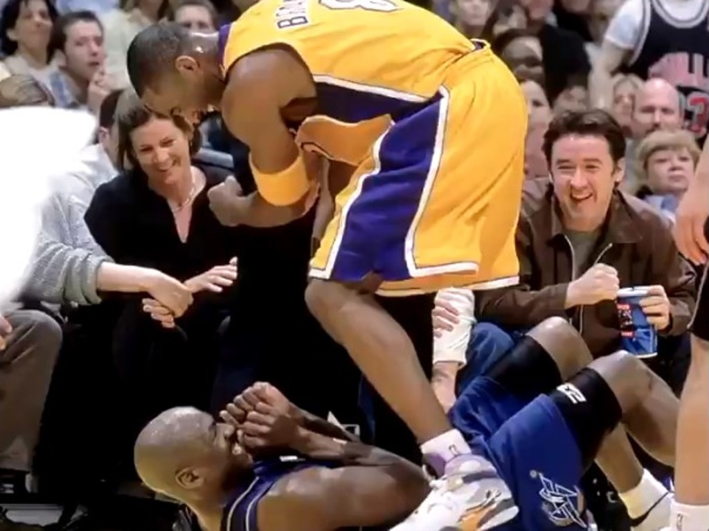 Kobe Bryant stands over Michael Jordan in their last match together.