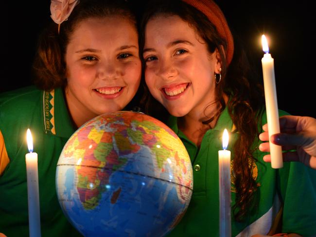 Thuringowa High students Monique Gale, 13, and Gemma Ogilvie, 12, are ready for Earth Hour. Picture: Evan Morgan