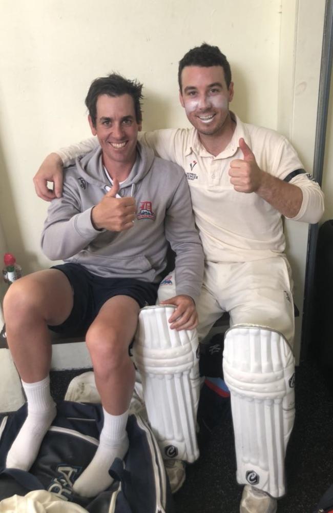 Tom Donnell and Brett Forsyth at stumps after raising their 14th century opening partnership for Dandenong.