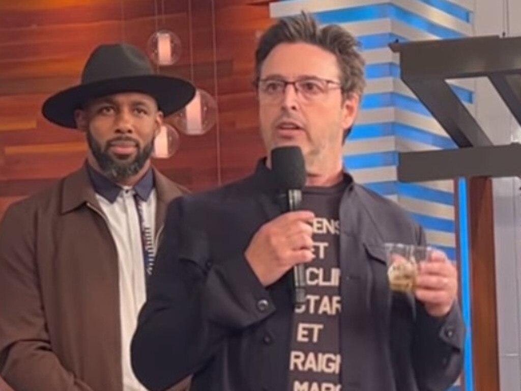 Stephen “tWitch” Boss in the background of the video where Ellen producer Andy Lassner console staff after the show’s end. Picture: Instagram.