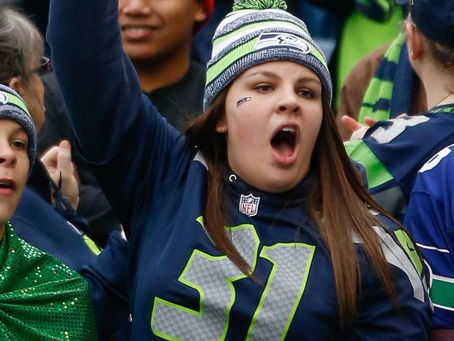 SEATTLE, WA - DECEMBER 28: A fan holds a sign prior to the game between the Seattle Seahawks and the St. Louis Rams at CenturyLink Field on December 28, 2014 in Seattle, Washington. Otto Greule Jr/Getty Images/AFP == FOR NEWSPAPERS, INTERNET, TELCOS & TELEVISION USE ONLY ==