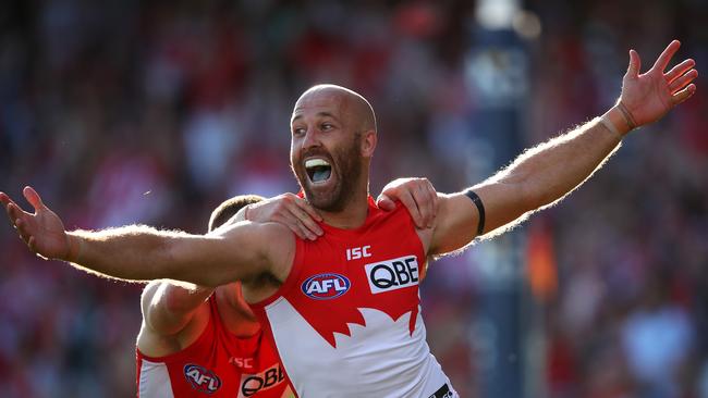 The retiring Jarrad McVeigh celebrates kicking a goal in his last game. Picture: Cameron Spencer/Getty Images