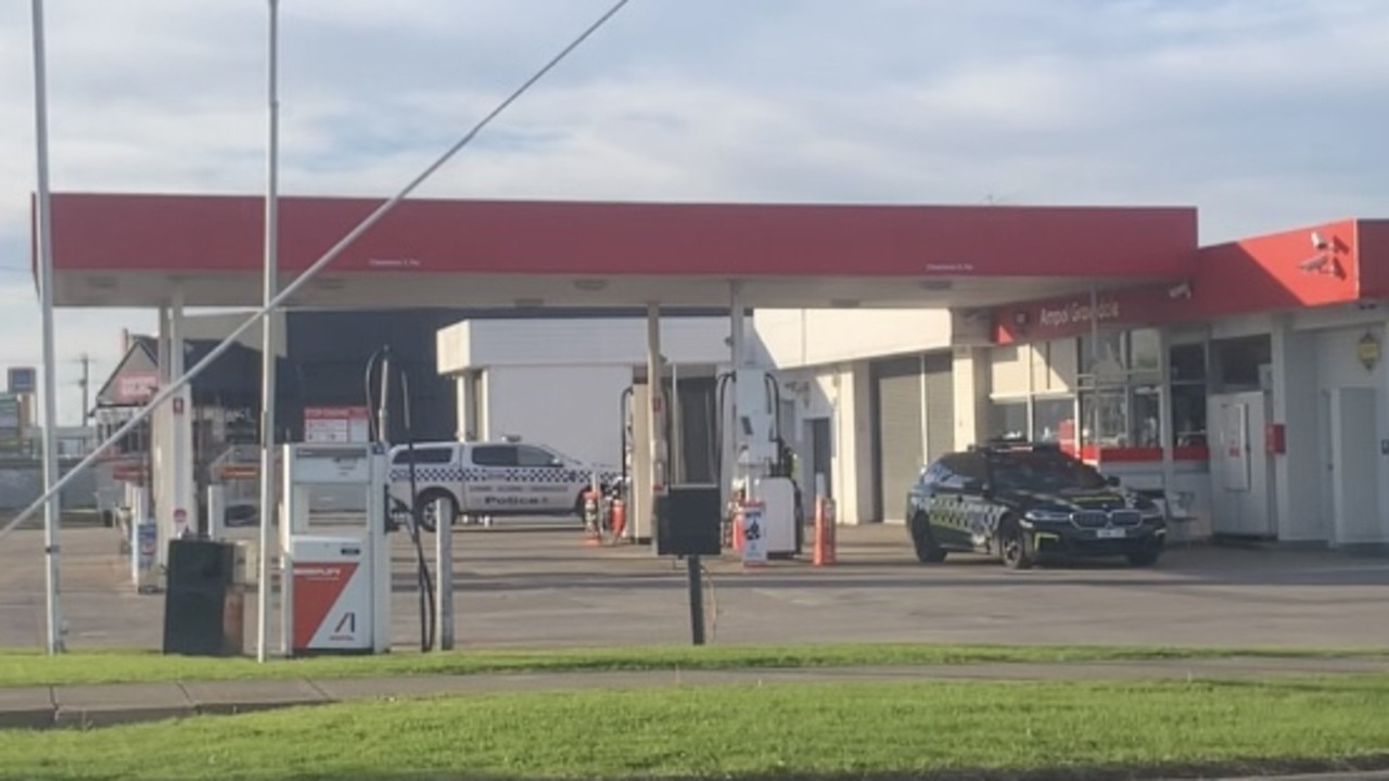 Police at the scene at Ampol in Grovedale. Picture: Lincoln Holmes