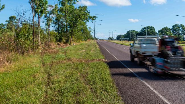 Tyre tracks show where the crash vehicle left the Stuart Highway close to the Elizabeth River Valley Road. Picture: Che Chorley