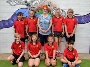 LOVED EDUCATOR: Kath Scotney with Bundaberg North State School Students David Baxter, Mia Godischkie, Bella-Rose Johnson, Jamie Spletter, Tyson Rickard, Nephiteri Brown, Sarah Wake and Cameron Raines. Picture: Geordi Offord