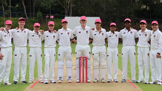 The victorious St Peters First XI side looking splendid in their pink caps - next to pink stumps for McGrath Foundation.