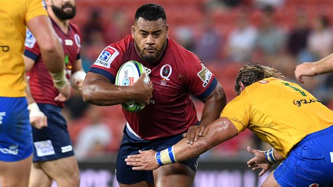 Reds prop Taniela Tupou takes on the Bulls defence.