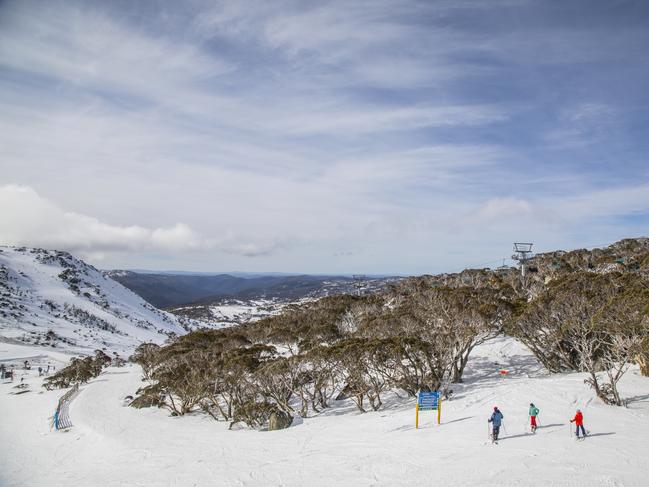 NSW SNOW SUPPLIED - People enjoying a day of skiing and snowboarding at Blue Cow ski resort in Perisher.