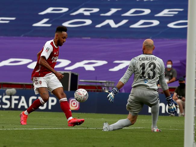 Pierre-Emerick Aubameyang lifts the ball over Chelsea goalkeeper Willy Caballero for Arsenal’s second goal. Picture: Getty Images