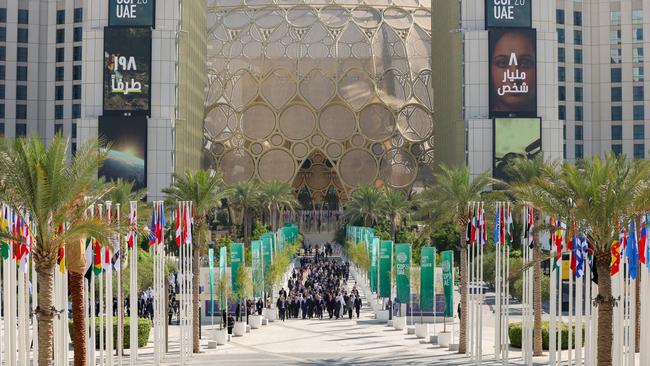 World leaders walking down Al Wasl avenue before their group photograph. Picture: Neville Hopwood/Getty Images