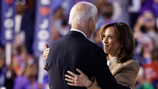 Kamala Harris with Joe Biden at the end of the first day of the Democratic National Convention. Picture: Getty Images via AFP.